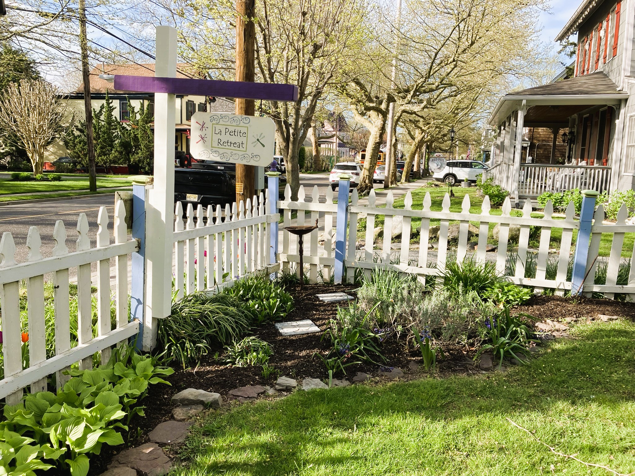 White picket fence surrounds the short-term vacation rental house in Cape May